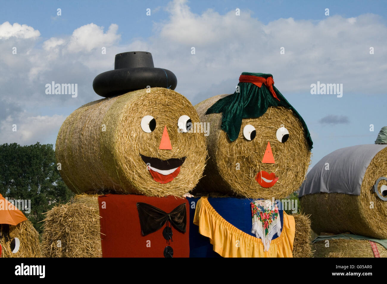 Two figures made out of straw bales Stock Photo