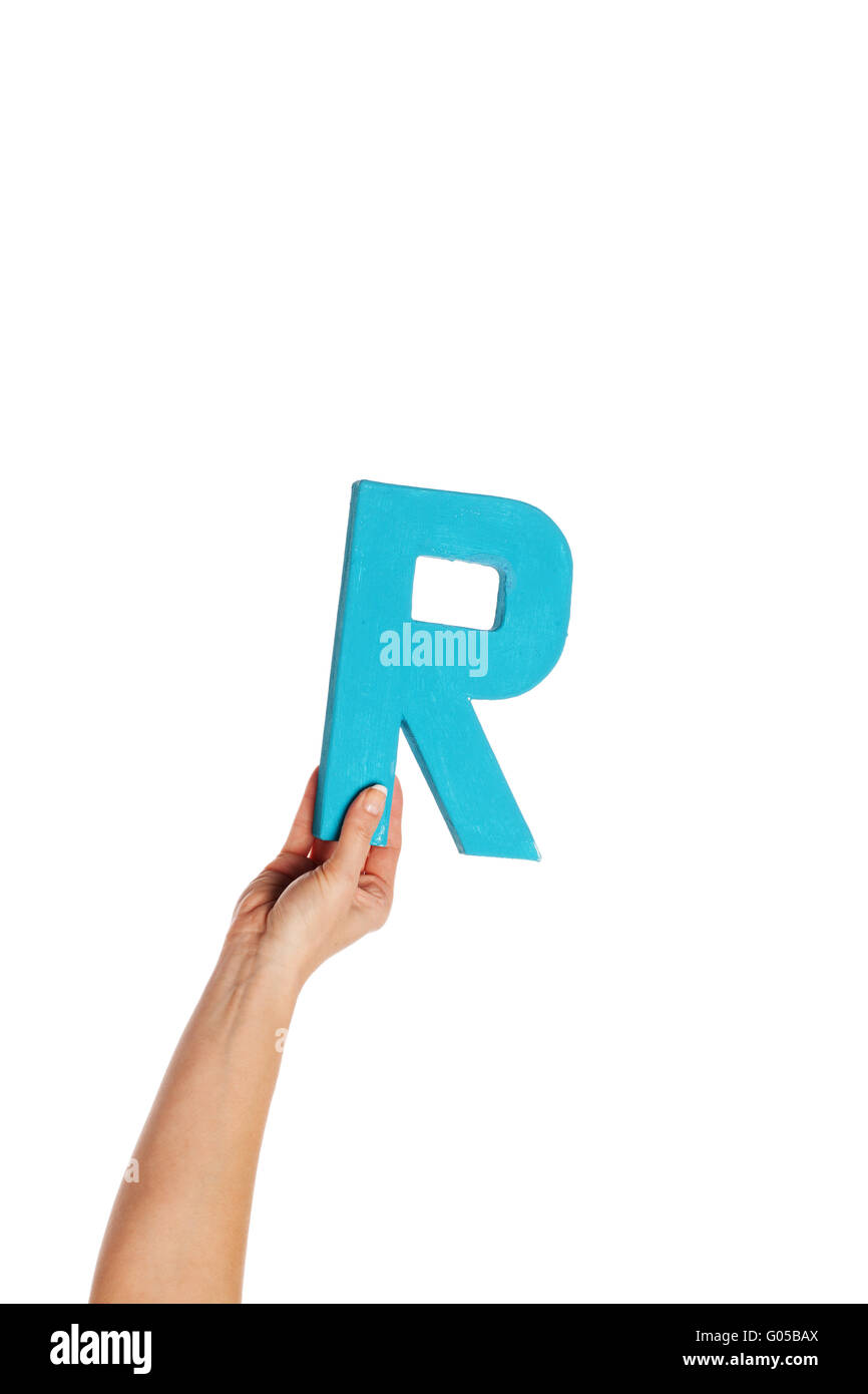 hand holding up the letter R from the bottom Stock Photo - Alamy