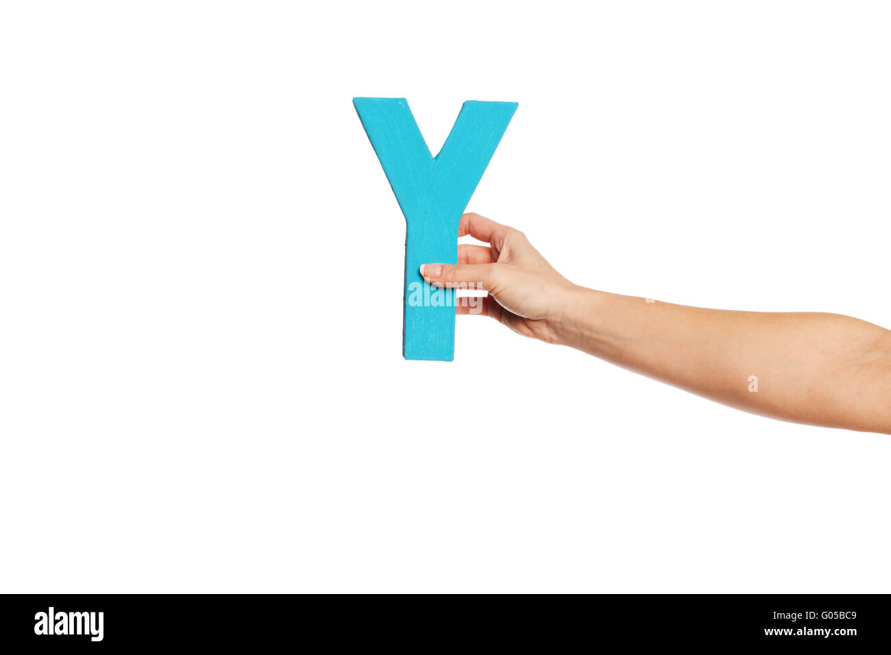 hand holding up the letter Y from the right Stock Photo