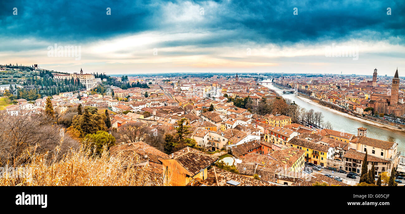 panorama of the Adige River as it passes through the houses and ...