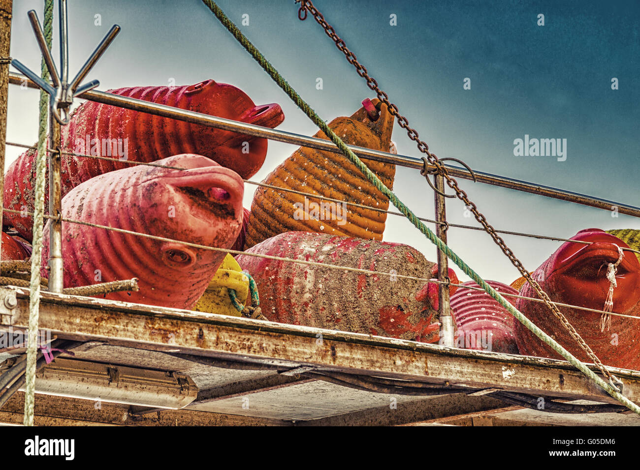 dirty floating buoys piled it on the boat Stock Photo Alamy