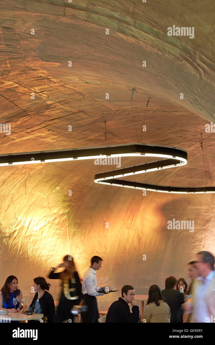 Curved ceiling and suspended lighting. Serpentine Summer Pavilion 2014, London, United Kingdom. Architect: Smiljan Radic, 2014. Stock Photo