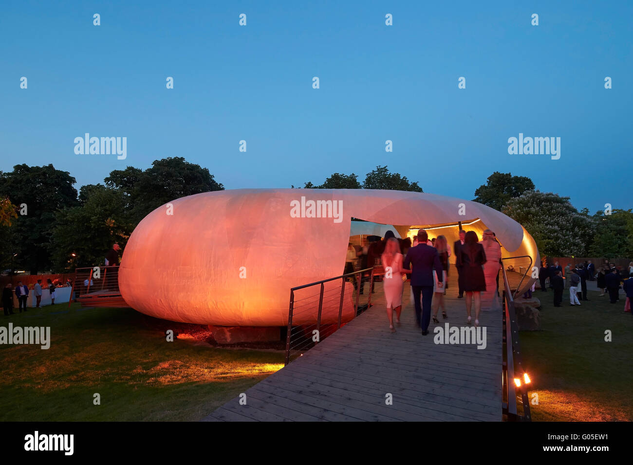 Opening night at the Serpentine Summer Pavilion 2014. Serpentine Summer Pavilion 2014, London, United Kingdom. Architect: Smiljan Radic, 2014. Stock Photo