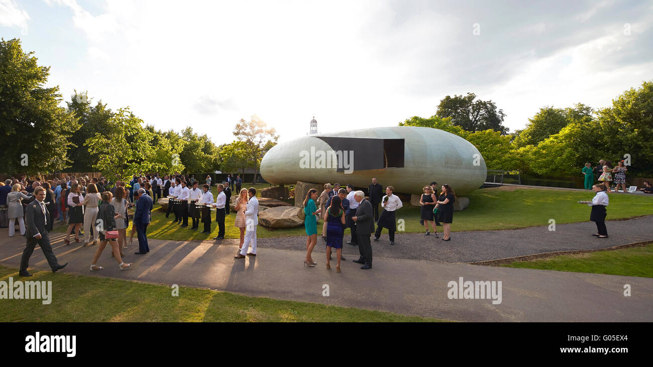 Opening at the Serpentine Summer Pavilion 2014. Serpentine Summer Pavilion 2014, London, United Kingdom. Architect: Smiljan Radic, 2014. Stock Photo