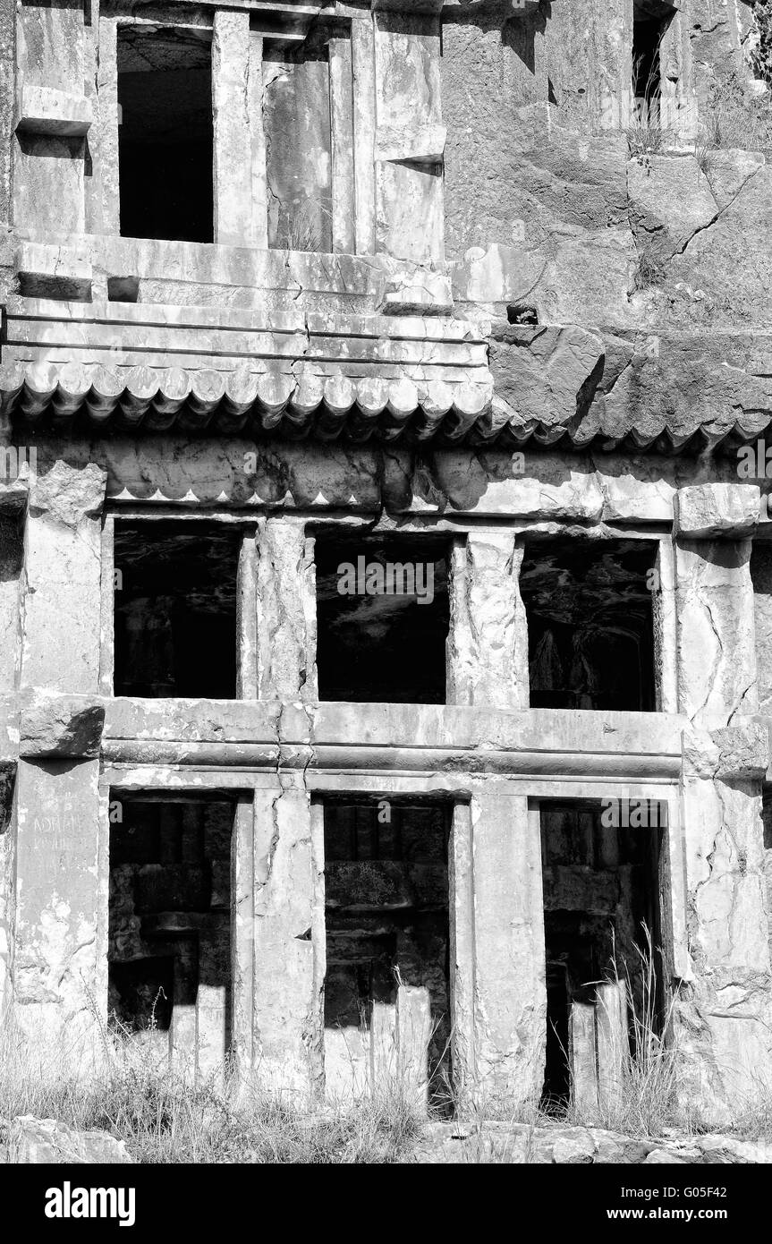 Ruin rock grave in Myra Turkey black and white Stock Photo