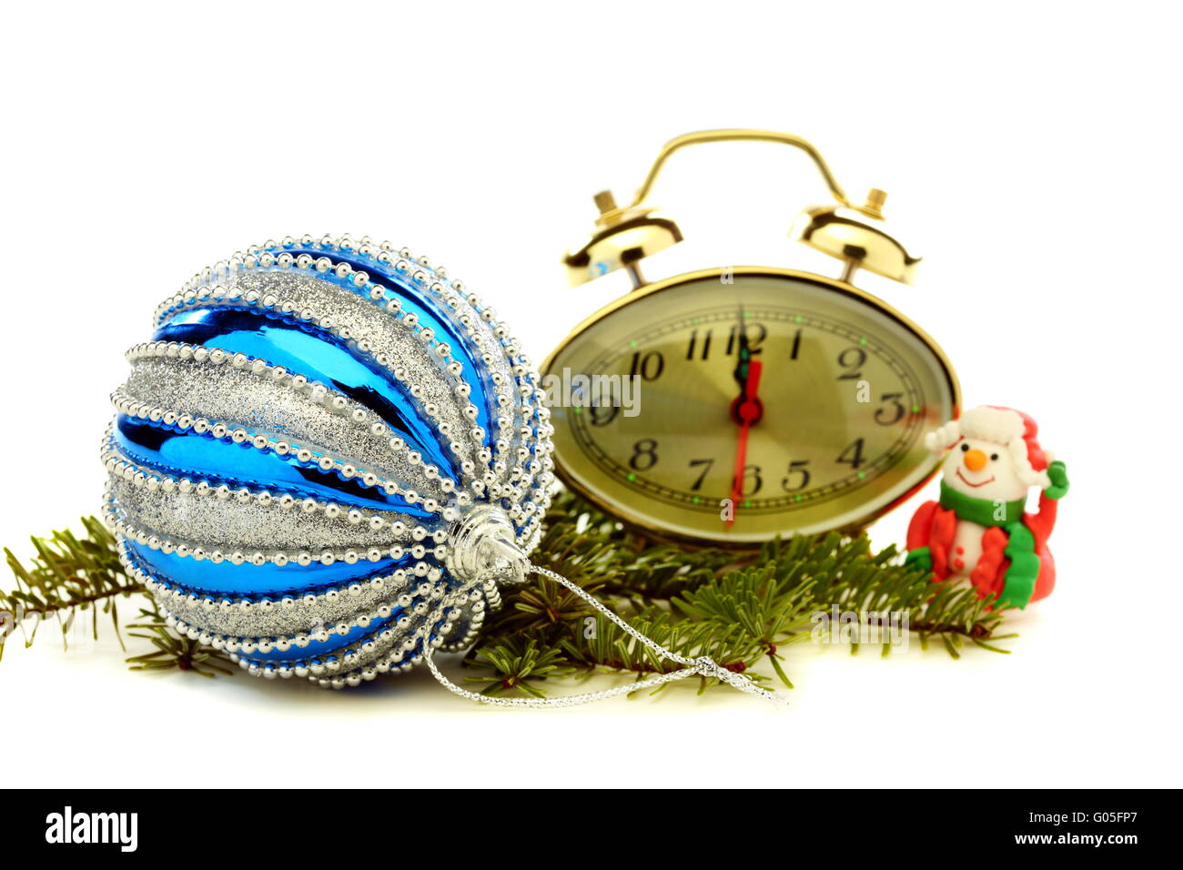 Christmas card with clock, snowman and blue ball. Stock Photo