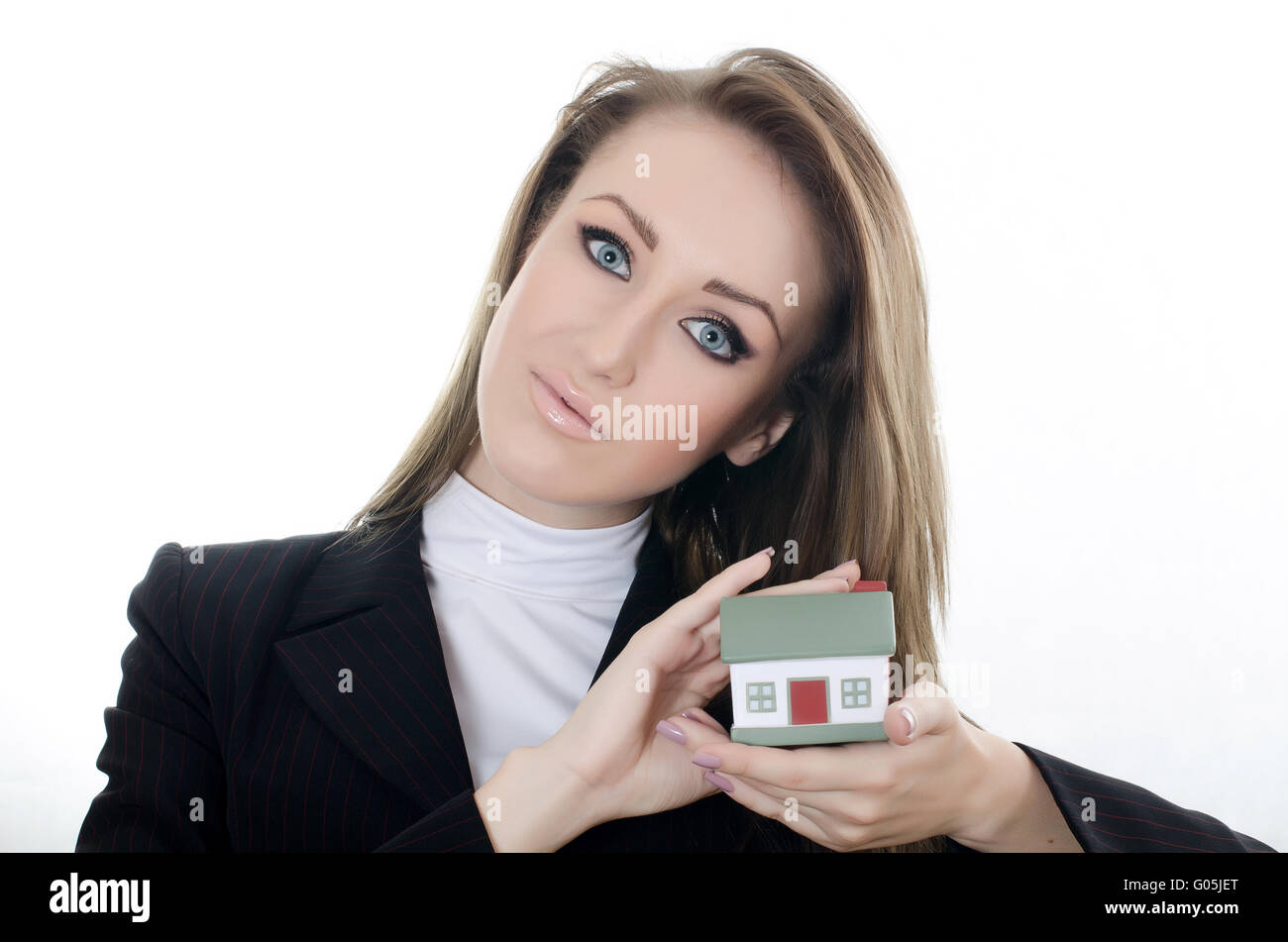 The business woman with small model of the house Stock Photo - Alamy