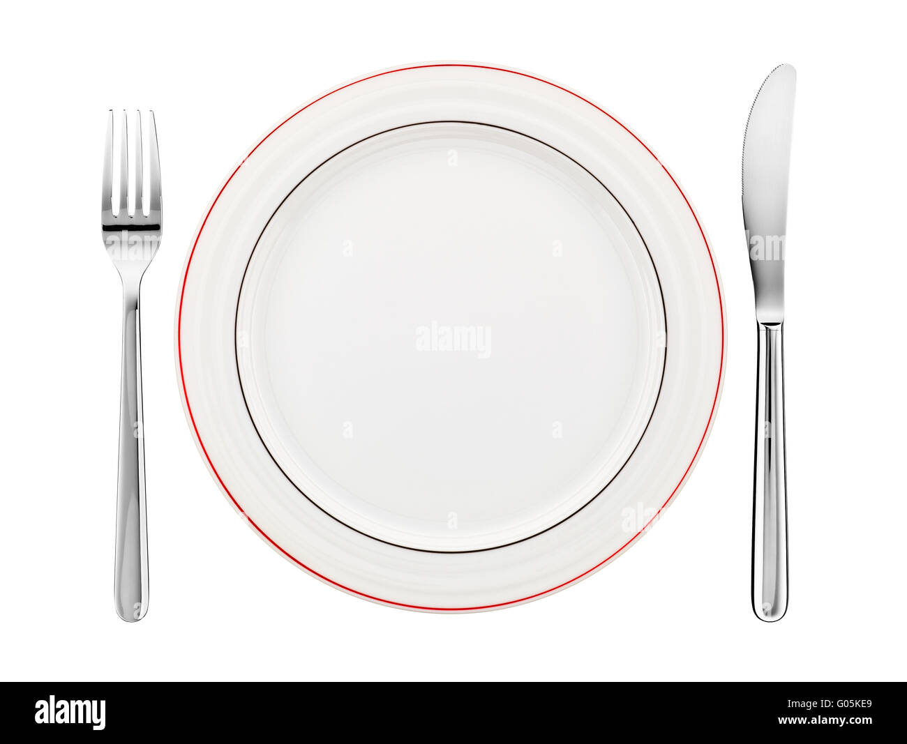 Place setting with plate, knife and fork Stock Photo
