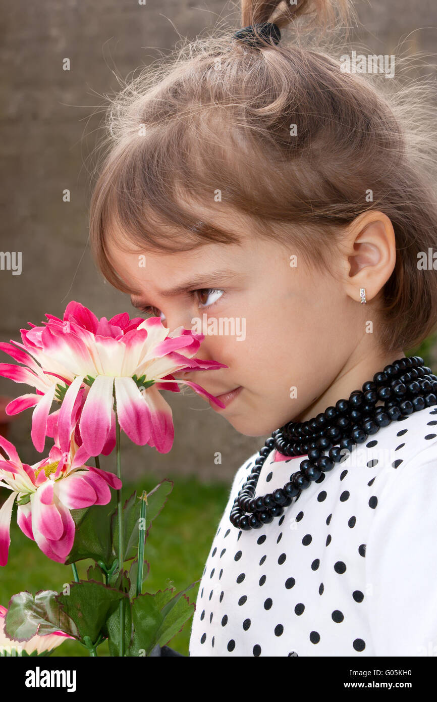 Child meadow smell flower hi-res stock photography and images - Alamy