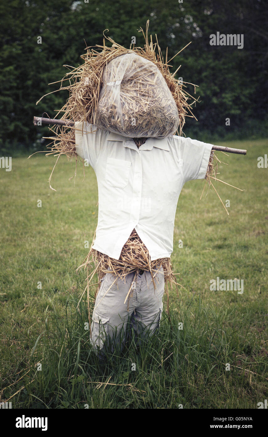 Rustic scarecrow stuffed with straw Stock Photo