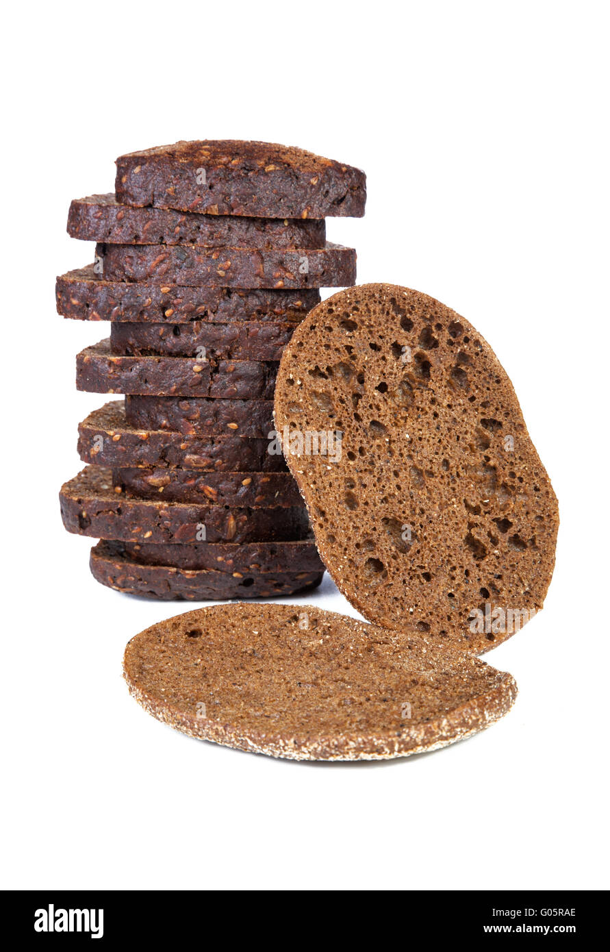 Two piles of slices  black bread isolated on a white background Stock Photo