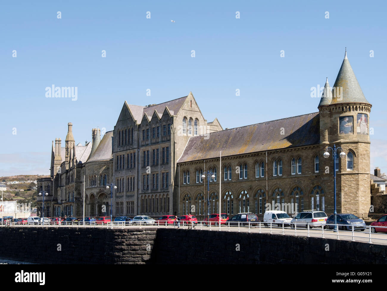 The Old College building of University of Wales on seafront. Built 1870's to J.P.Seddon's Gothic design. Aberystwyth Wales UK Stock Photo