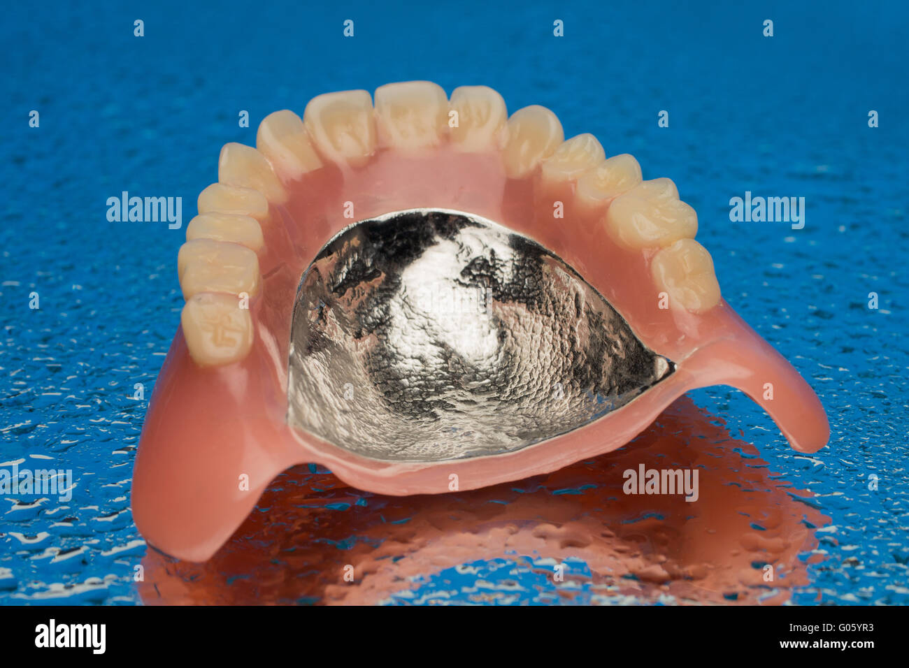 Full dentures denture blue water drops Stock Photo