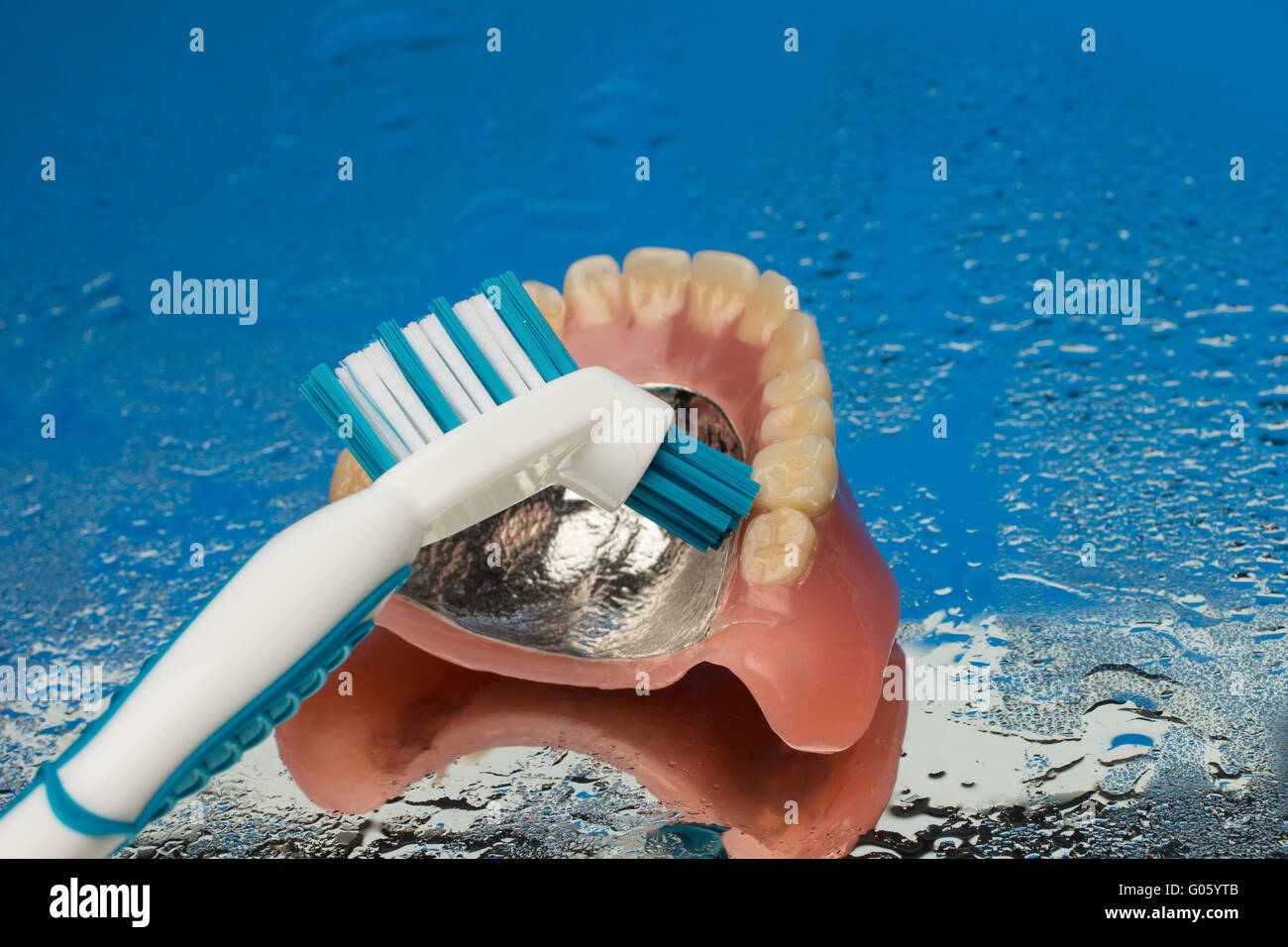 Dentition denture toothbrush Stock Photo