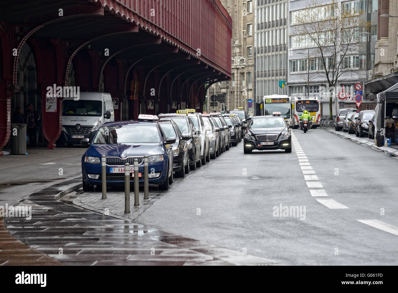 Taxis waiting for passengers outside of Central Railway Station in Antwerp, Belgium on April 28, 2016. Belgium has much less tou Stock Photo
