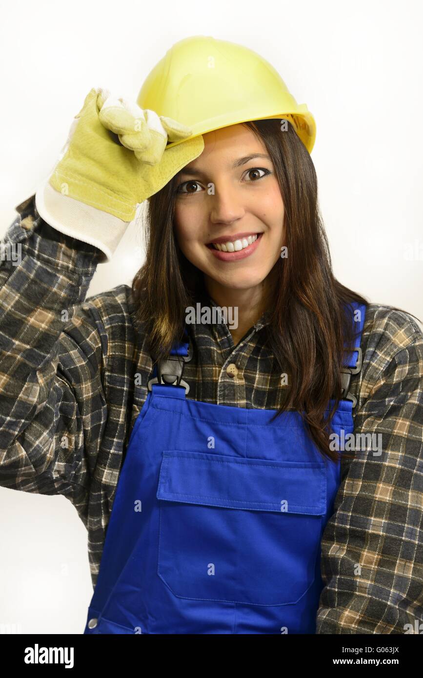 brunette young woman with work clothes and safety Stock Photo