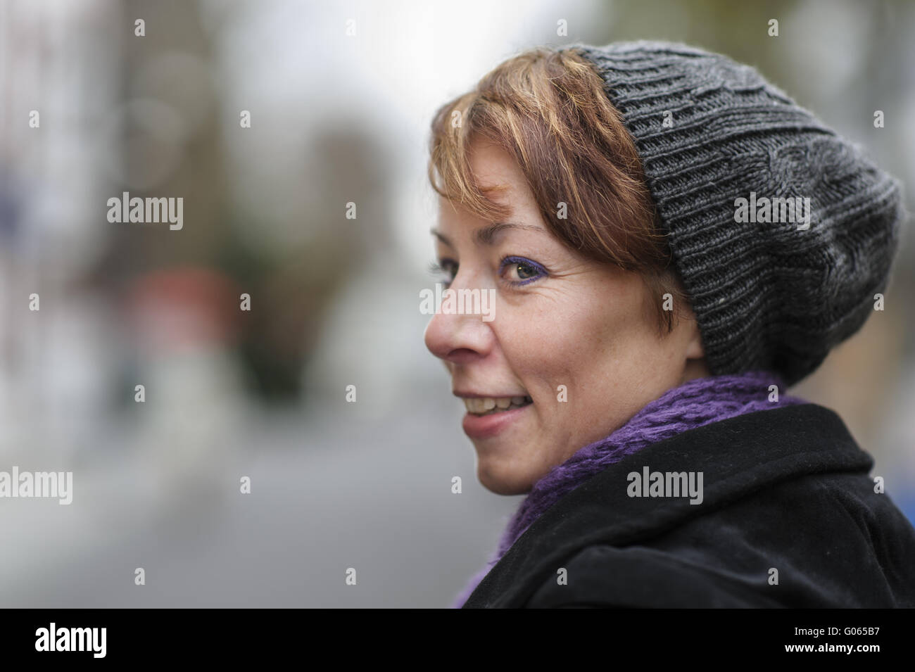 Portrait of a young woman with a knitted hat Stock Photo - Alamy