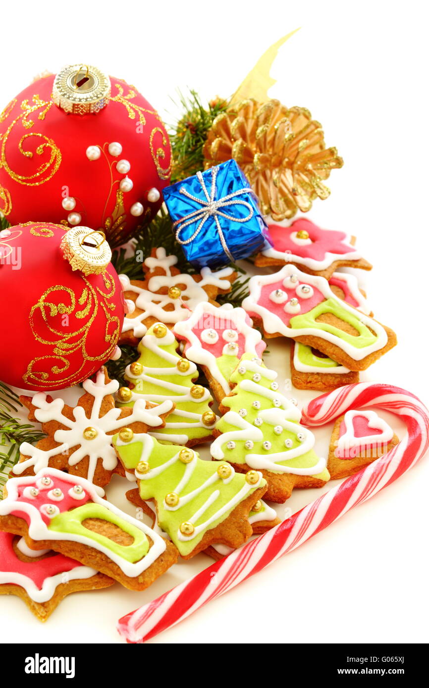 Christmas balls, gingerbread and golden cones. Stock Photo