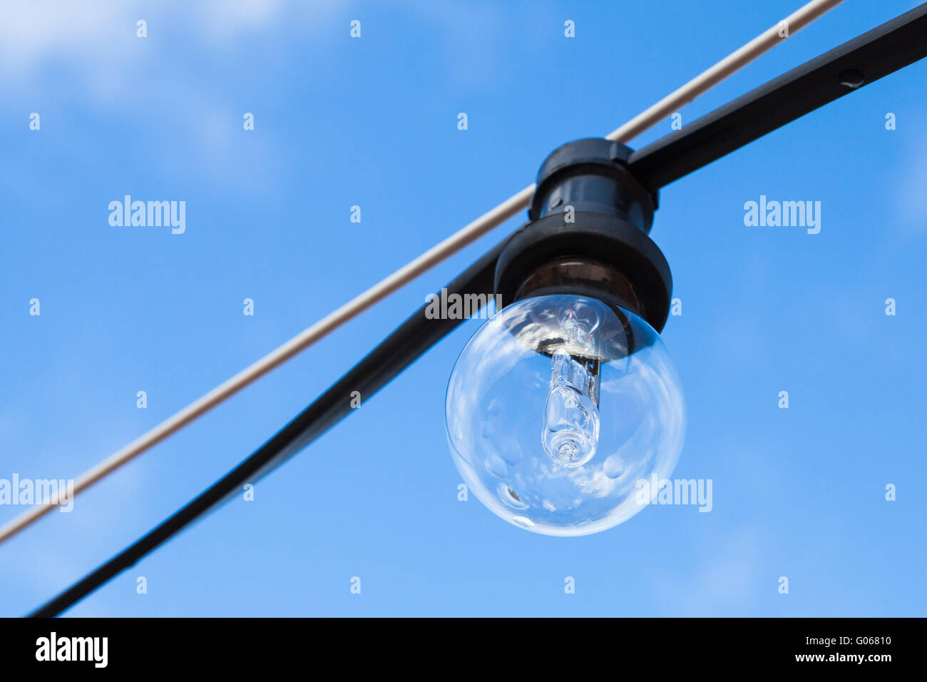 Incandescent lamp is off, closeup photo with selective focus Stock Photo