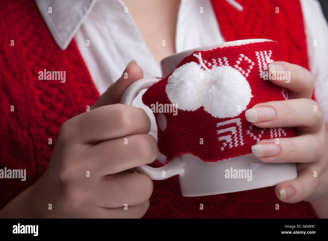 beautiful woman's hands holding a cup of the beverage Stock Photo - Alamy