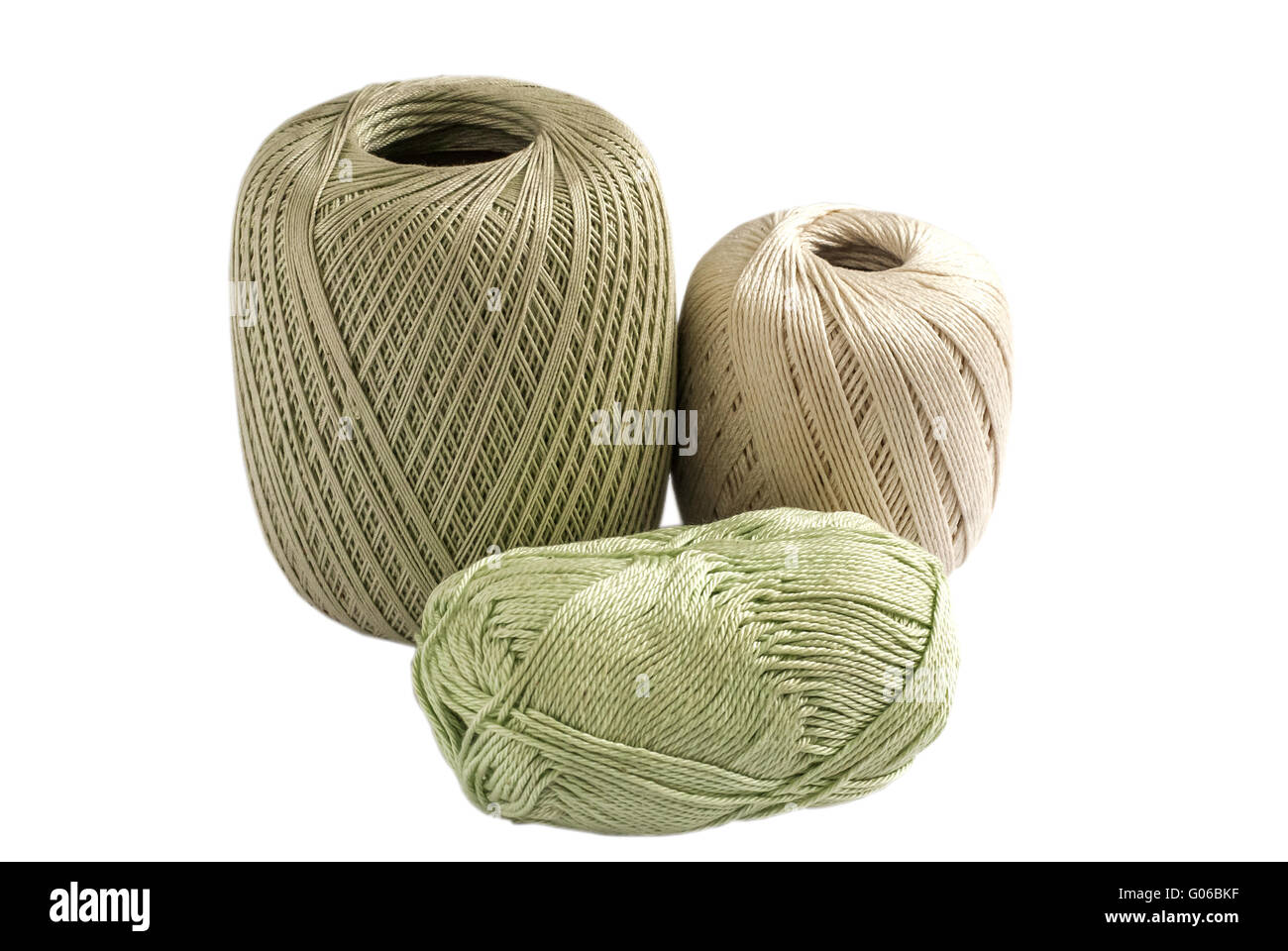 Three skeins of yarn for knitting isolated on whit Stock Photo - Alamy
