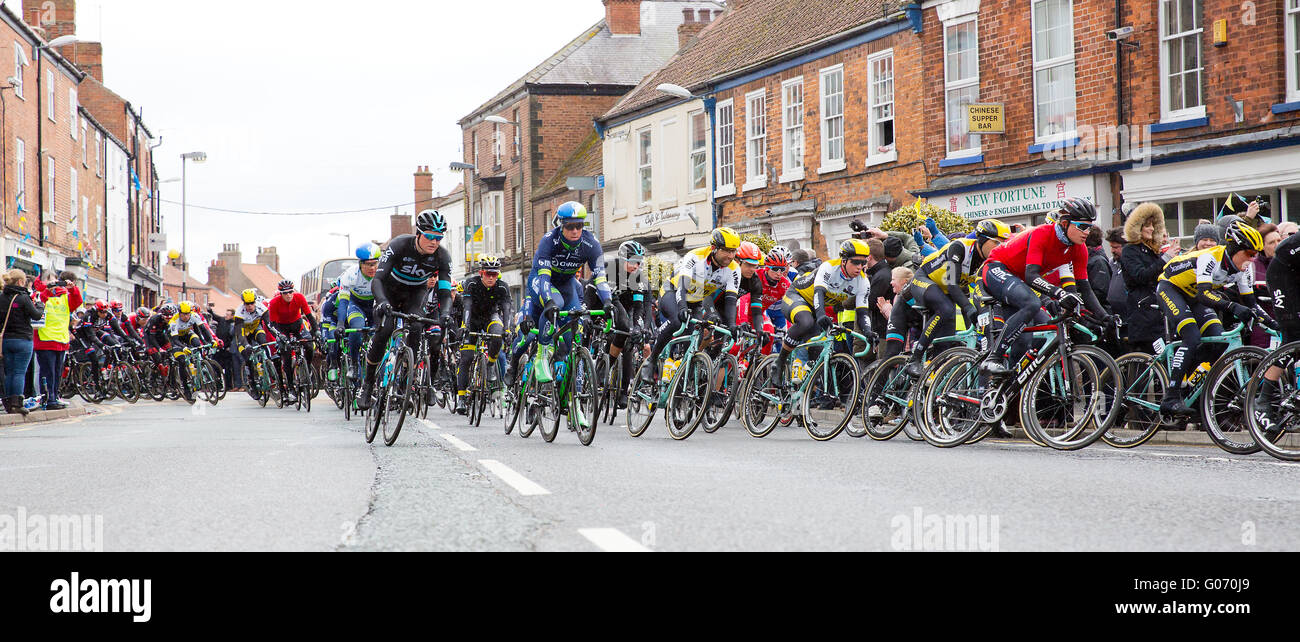The Tour De Yorkshire 2016 cycle race riding through the high street of