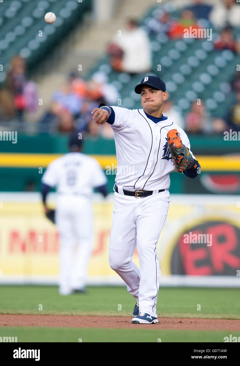 Detroit, Michigan, USA. 27th Apr, 2016. Detroit Tigers shortstop Jose Iglesias (1) throws the ball to first base during MLB game action between the Oakland Athletics and the Detroit Tigers at Comerica Park in Detroit, Michigan. The Tigers defeated the Athletics 9-4. John Mersits/CSM/Alamy Live News Stock Photo