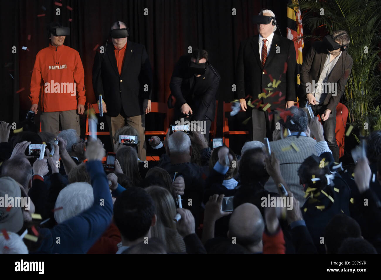 College Park, MARYLAND, USA. 30th Apr, 2016. Brendan Iribe, Co-Founder and CEO, Oculus VR, Inc., seen pretending to use a virtual shovel while wearing an Oculus headset for the official groundbreaking for the Brendan Iribe Center. Also seen wearing Oculus headsets are University of Maryland President Wallace Loh, Maryland Governor Larry Hogan, Maryland Senate President Thomas ''Mike'' Miller, Jr., and Co-Founder and Chief Software Architect of Oculus VR Michael Antonov. The ceremony was held in Lot GG1 the future site of the building at the University of Maryland. (Credit Image: © Evan Gol Stock Photo