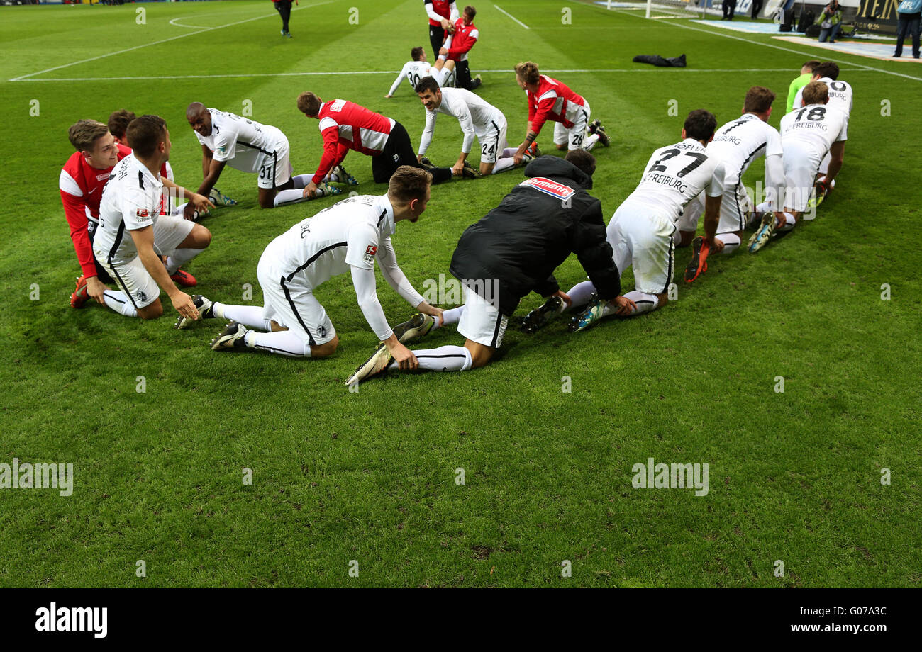 Freiburg's team celebrating the 2:1 victory at the German 2nd Bundesliga soccer match between SC Paderborn 07 and SC Freiburg at Benteler-Arena in Paderborn, Germany, 29 April 2016. PHOTO: INA FASSBENDER/dpa Stock Photo