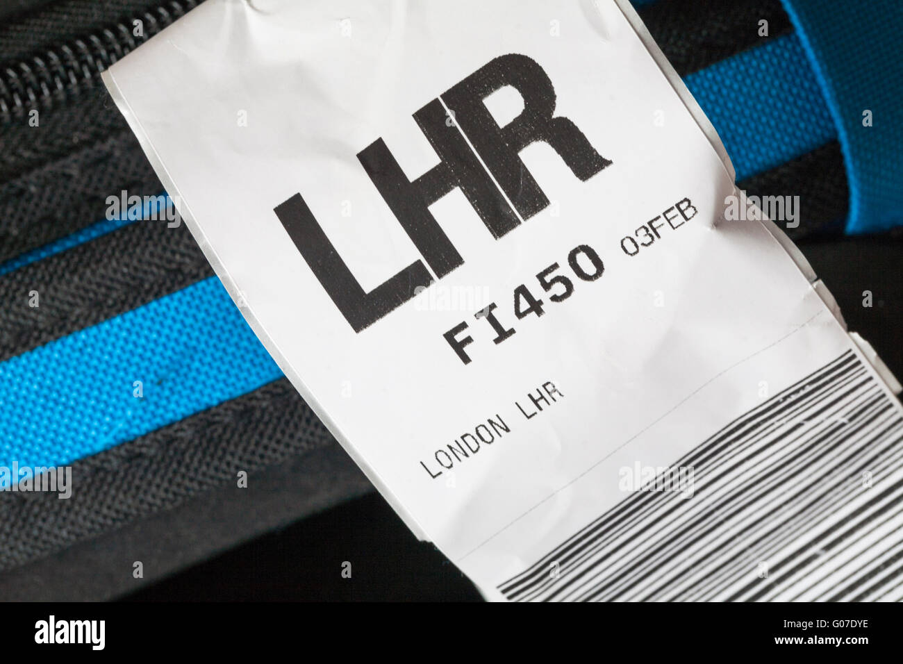 IcelandAir luggage label stuck on case for LHR London Heathrow airport in England UK Stock Photo
