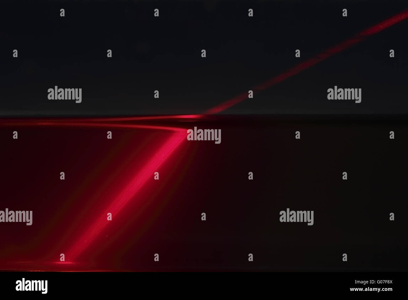 Refraction of a laser beam at airwater boundary Stock Photo Alamy