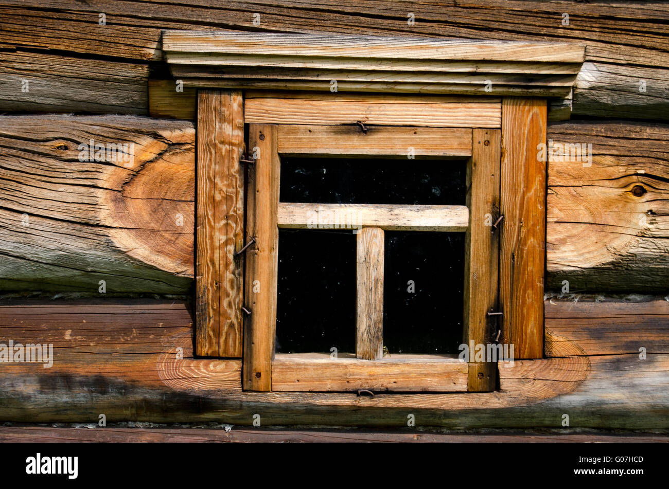 Window in the old wooden house Stock Photo
