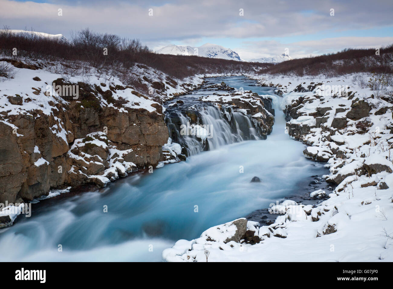 Hlauptungufoss waterfall on the Bruara river in winter, Suedland, Iceland Stock Photo