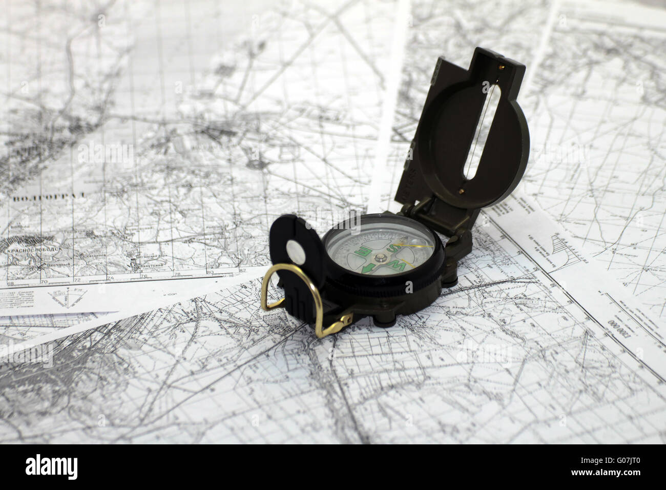 Compass on the background black-and-white city map Stock Photo - Alamy