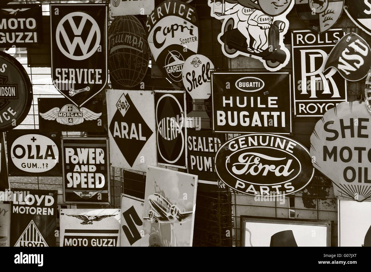 Image showcasing Vintage Metal Signs bw Stock Photo - Alamy