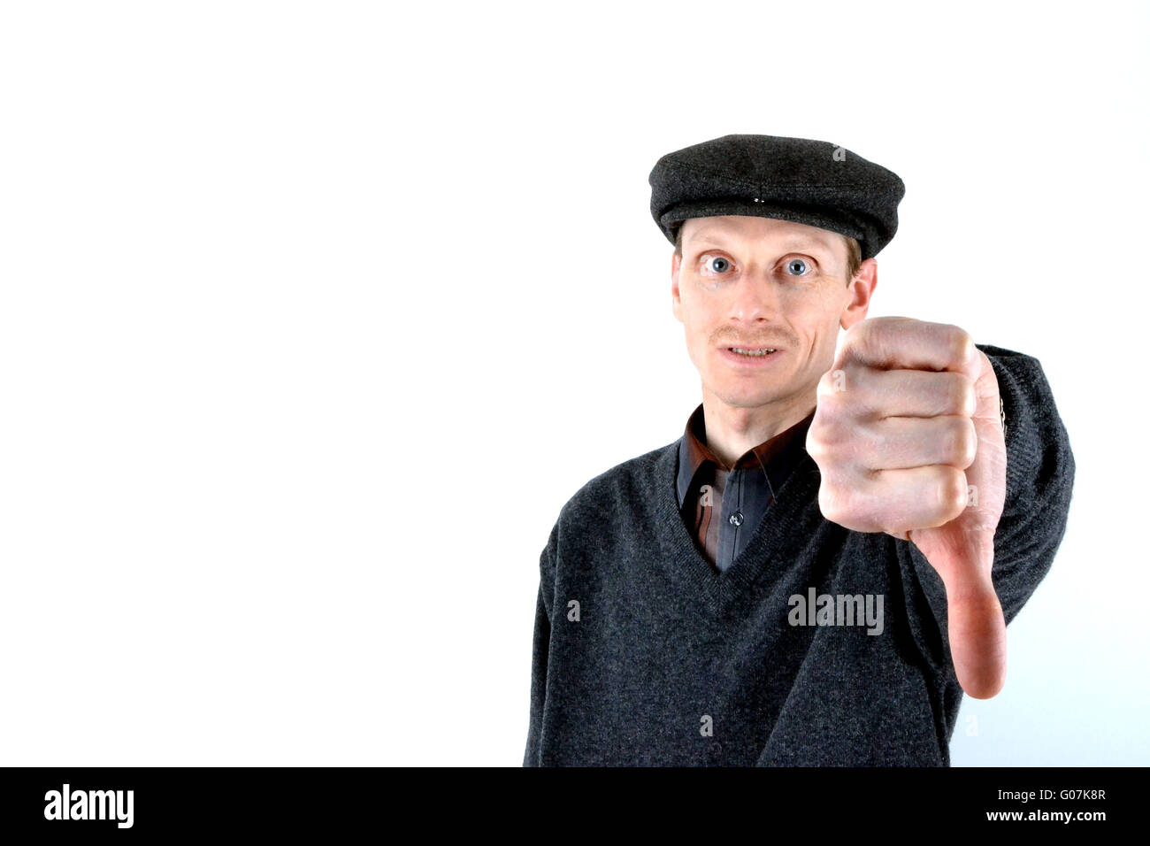 Man with hat of the thumb decreases Stock Photo