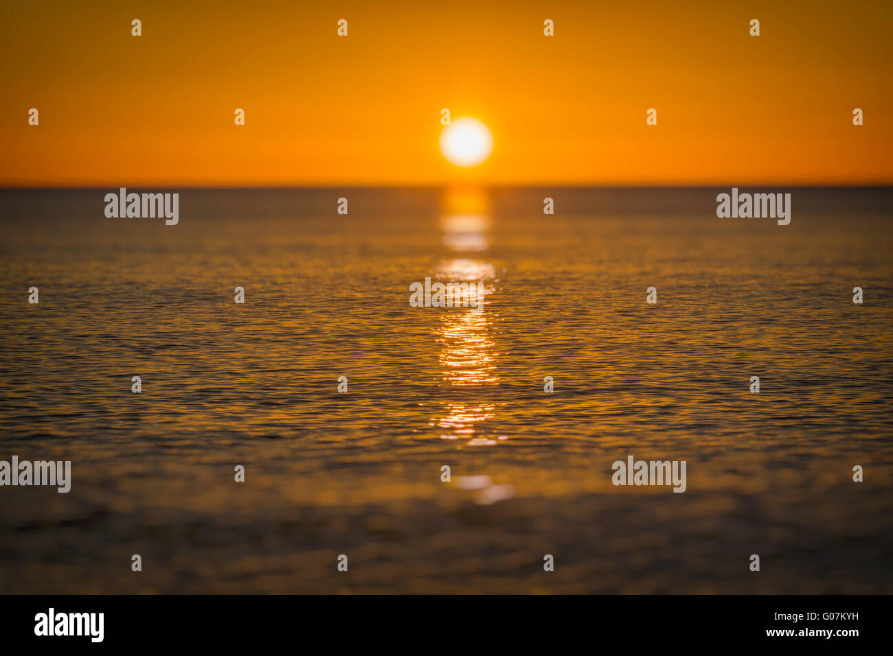 Golden sunrise in sea hi-res stock photography and images - Alamy