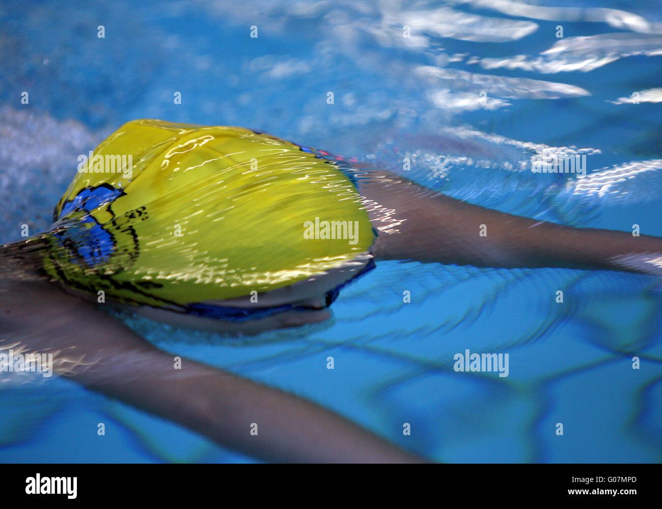 sliding under water Stock Photo