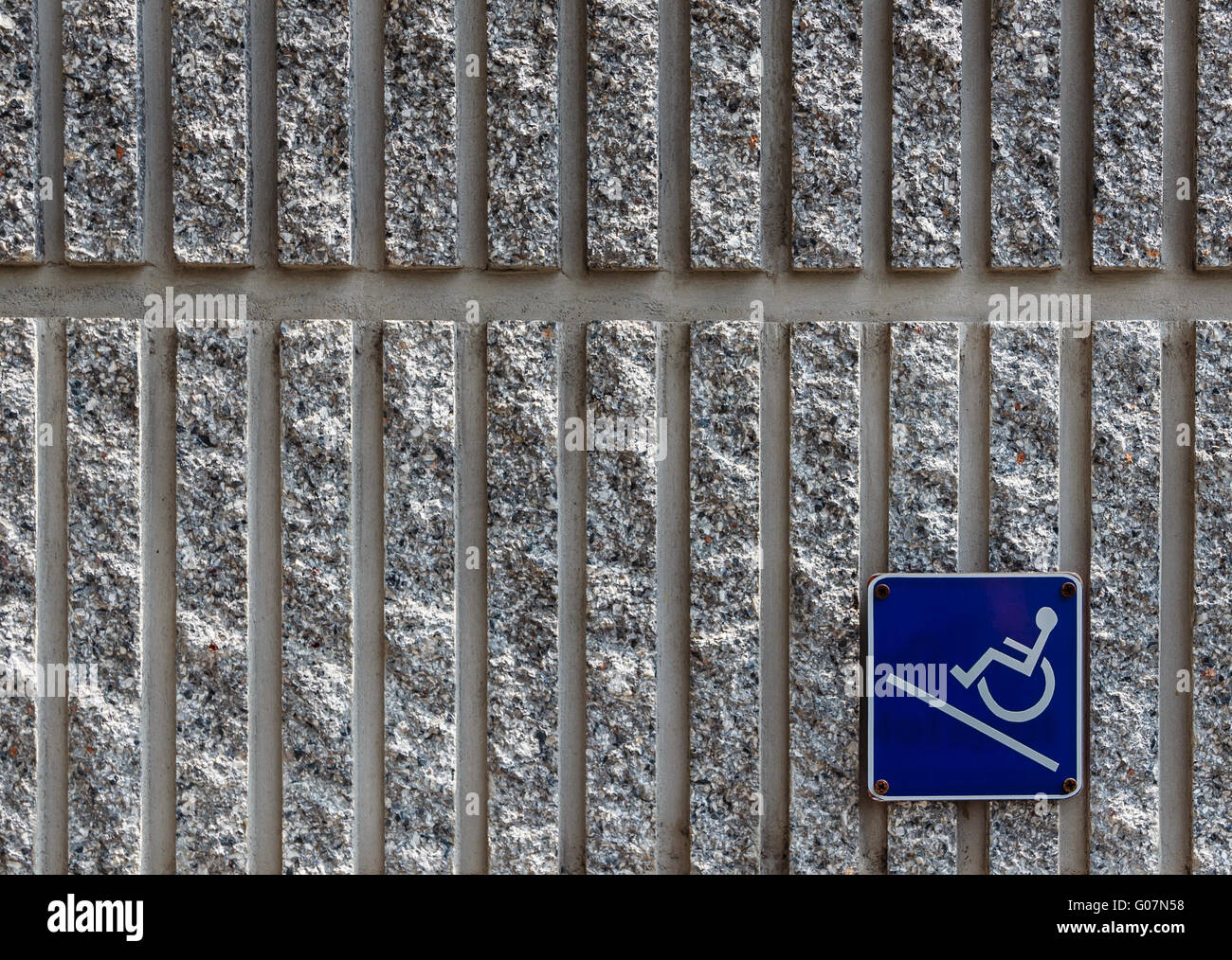Ramp access sign on concrete wall background Stock Photo - Alamy