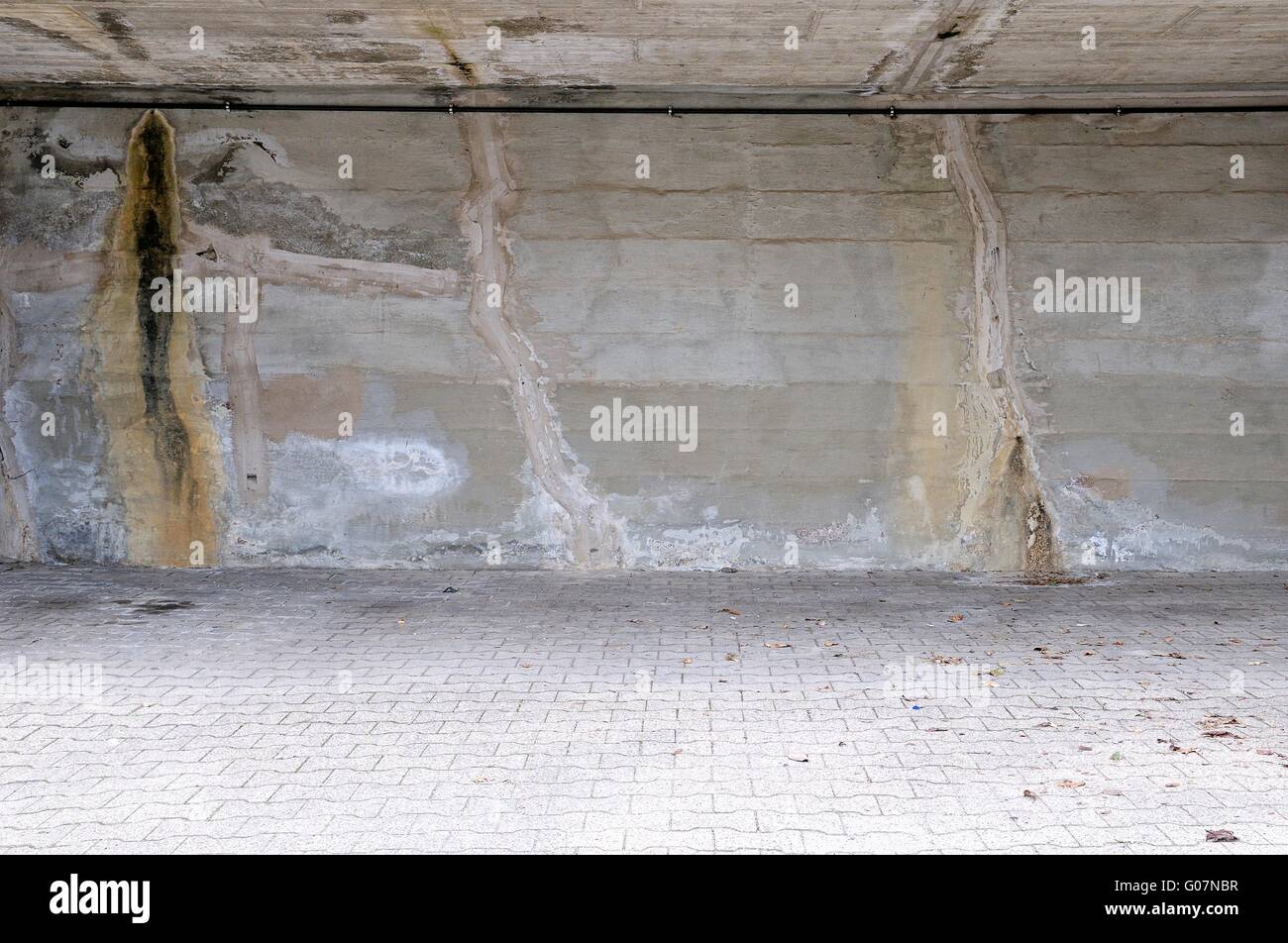 wet and humid - concrete is old and brittle Stock Photo