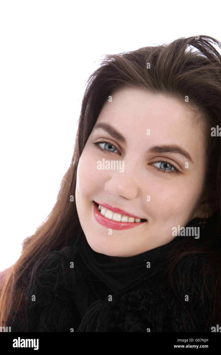 Blue eyed happy young woman looking at camera Stock Photo