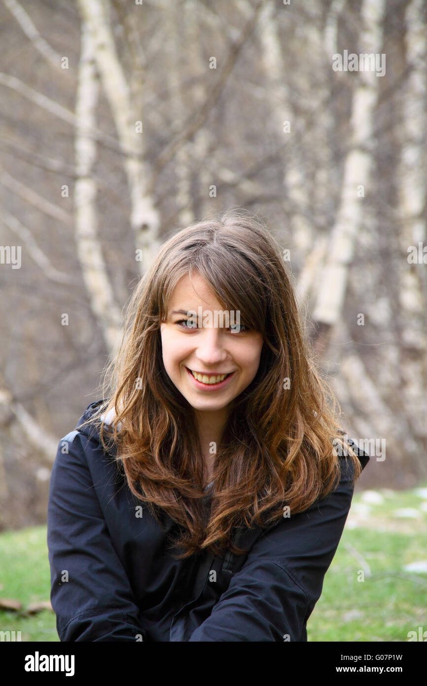 Portrait of a beautiful young girl on the backgrou Stock Photo - Alamy