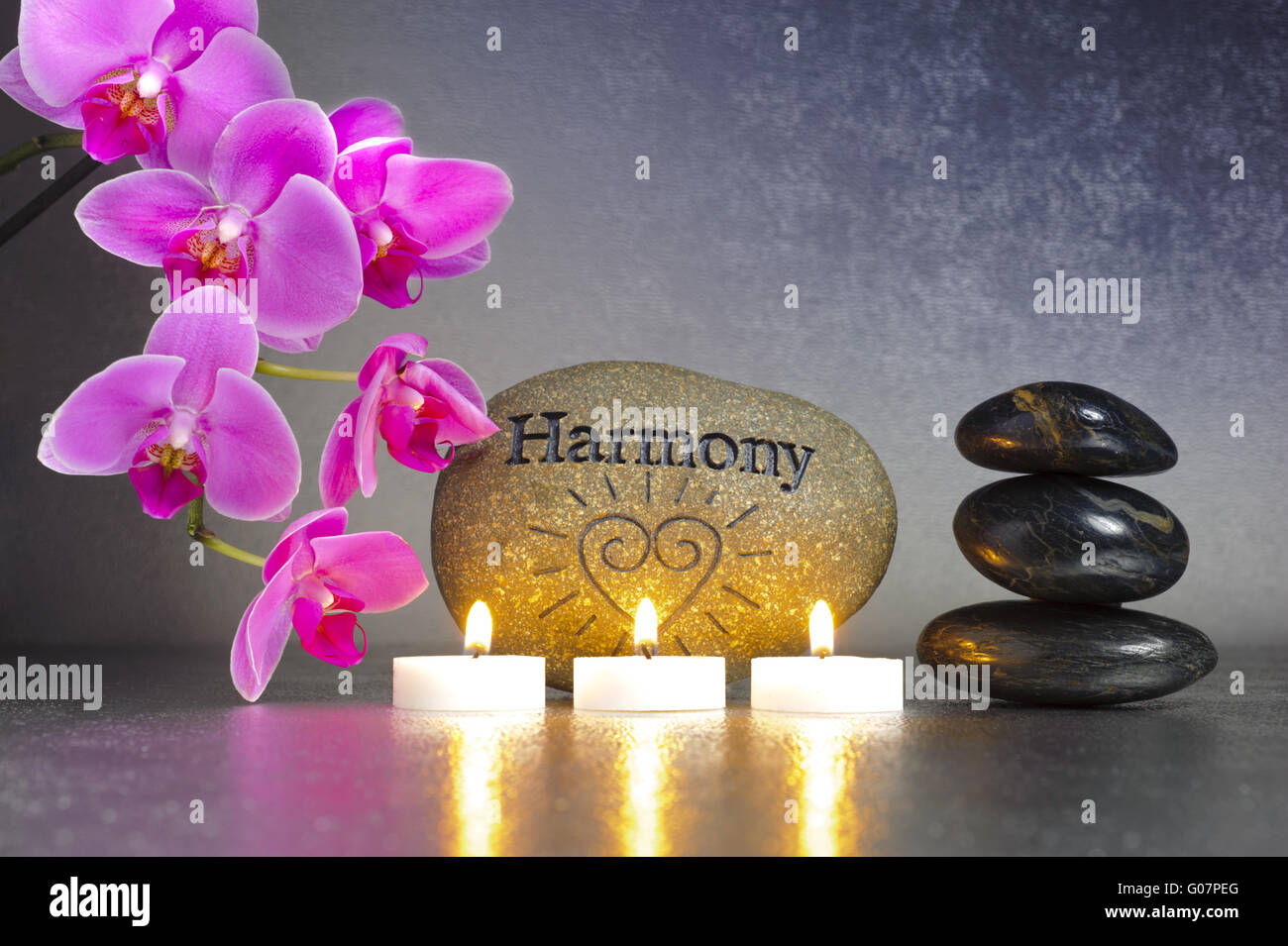 japanese zen garden with orchid and candle light Stock Photo