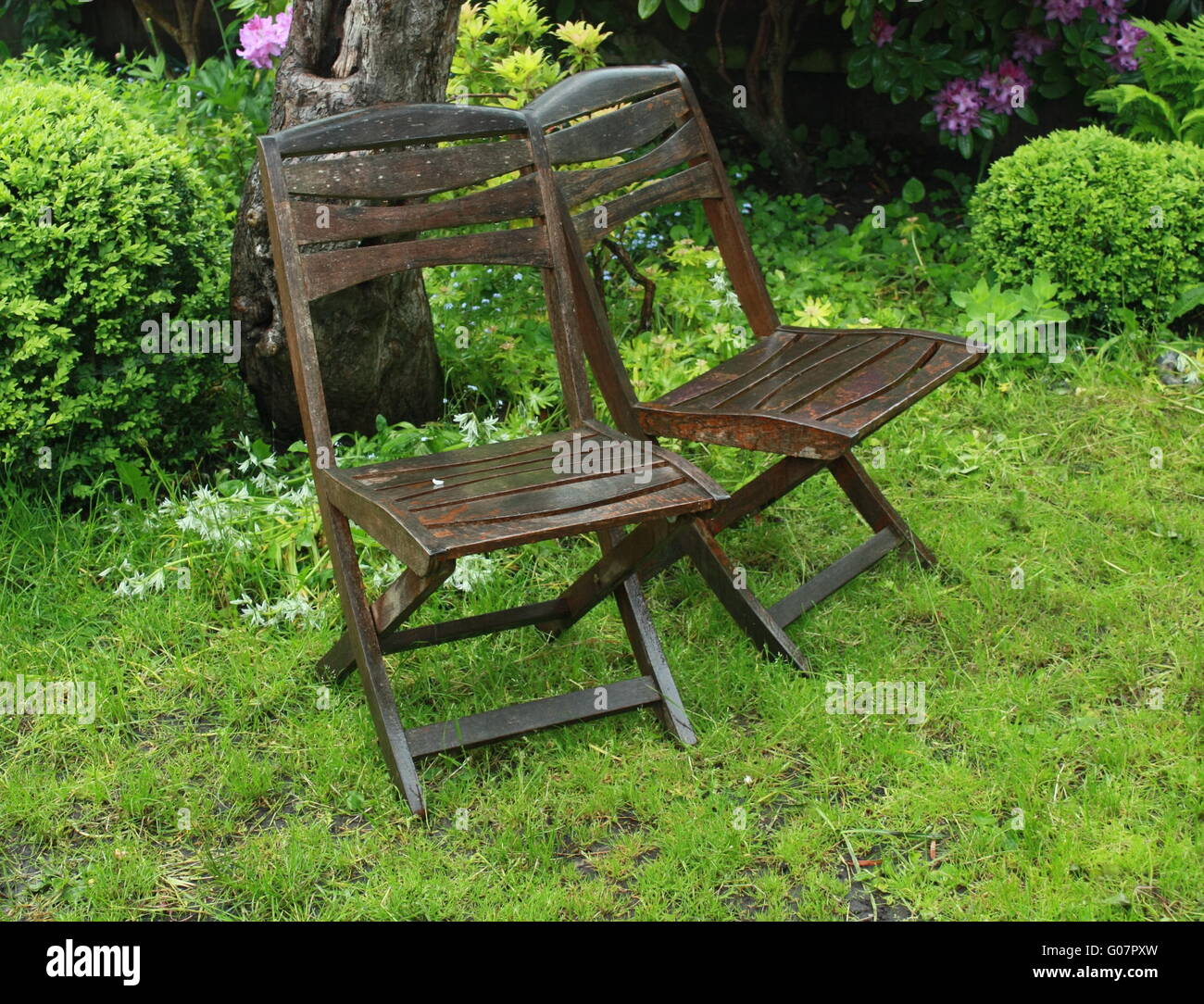 Garden chairs in the rain Stock Photo Alamy