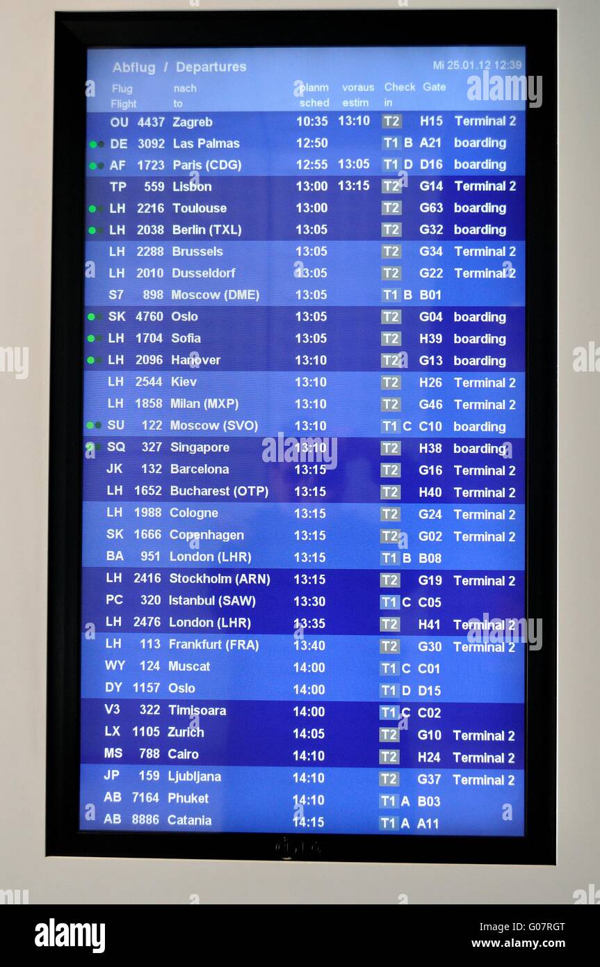 Airport departures information board Stock Photo