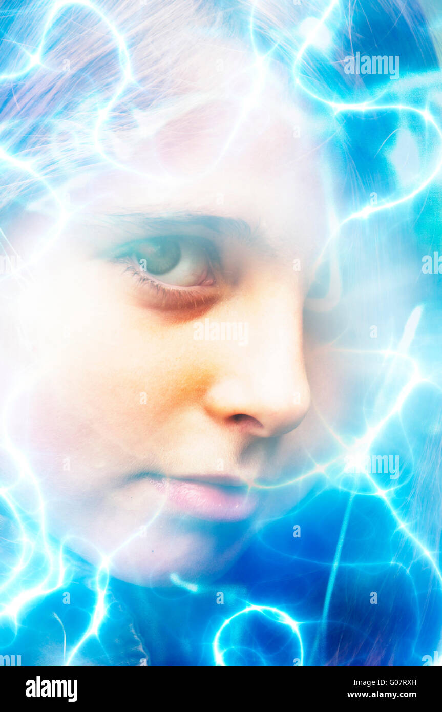 girl face surrounded by light streaks Stock Photo