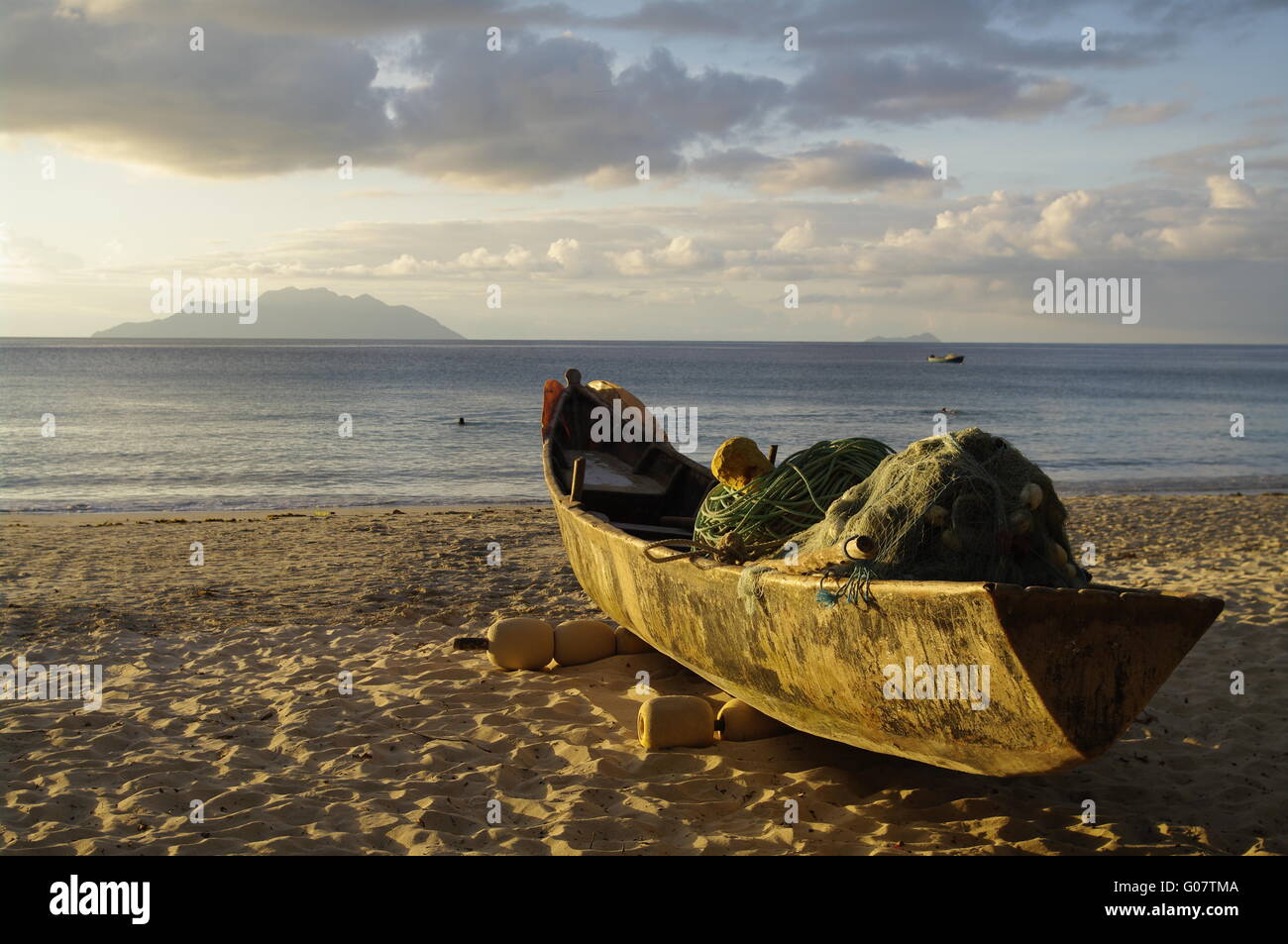 Old traditional fishing boat at Beau Vallon beach Stock Photo