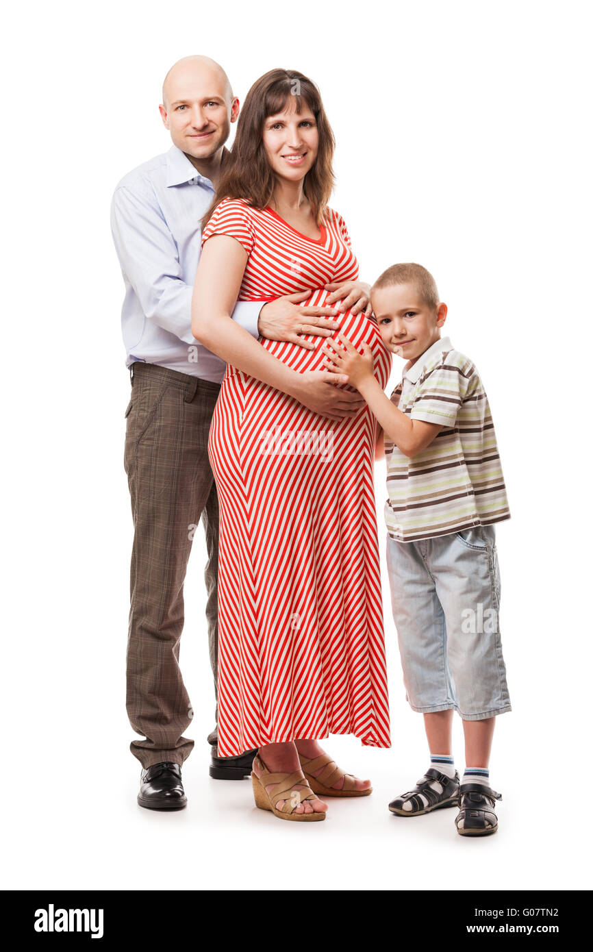 Little smiling child boy with father and pregnant Stock Photo