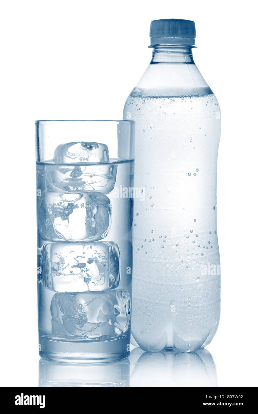 Bottle of mineral water and glass with ice cubes isolated Stock Photo ...