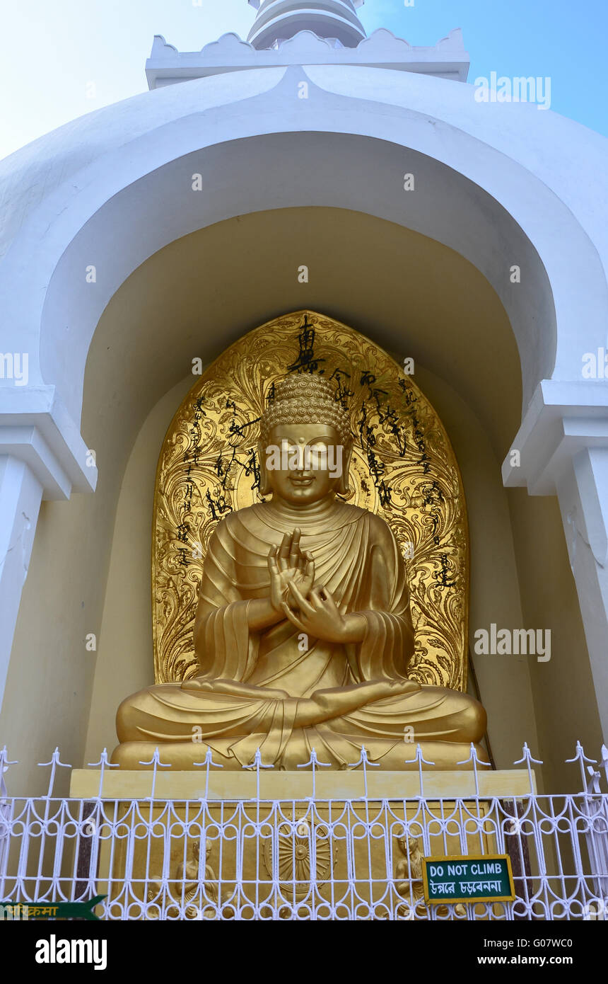A statue of Buddha at Peace Pagoda situated in Darjeeling, West Bengal, India Stock Photo